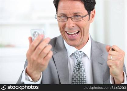 Businessman on the phone laughing