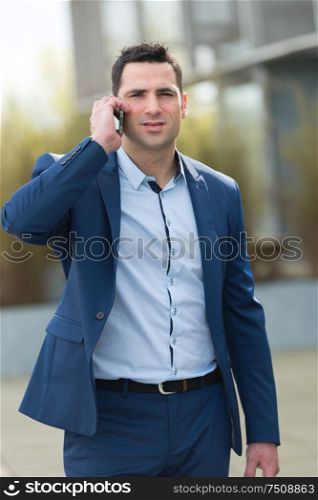 businessman on the phone outdoors