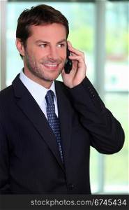 Businessman on the phone smiling