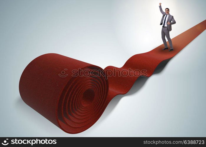 Businessman on the red carpet in success concept