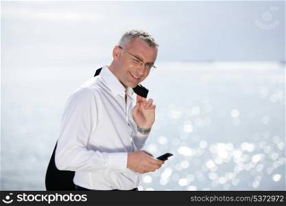 businessman on vacation talking on his cell