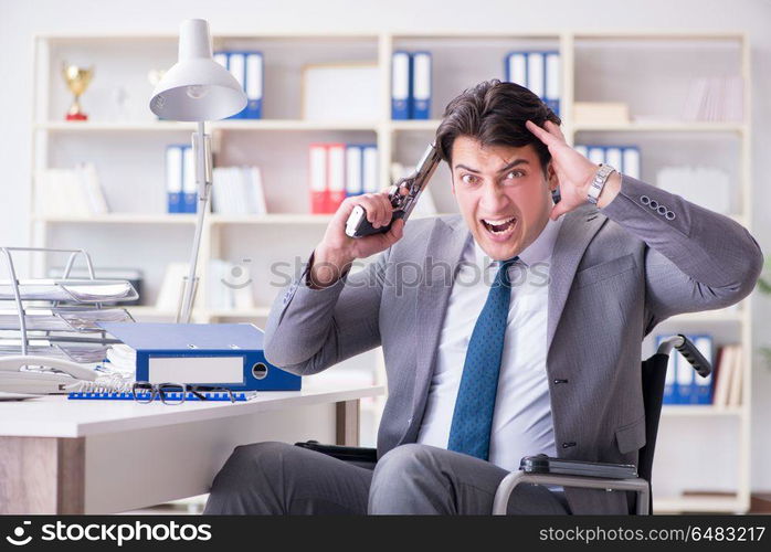 Businessman on wheelchair committing suicide. Disabled businessman on wheelchair in disability concept