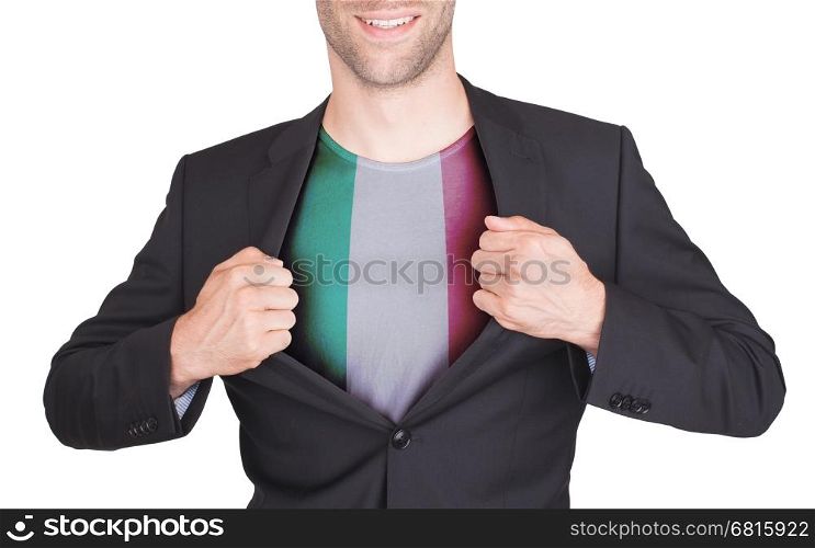 Businessman opening suit to reveal shirt with flag, Italy