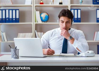 Businessman operator traveling agent working in the office