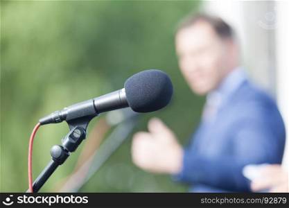 Businessman or politician is giving a speech