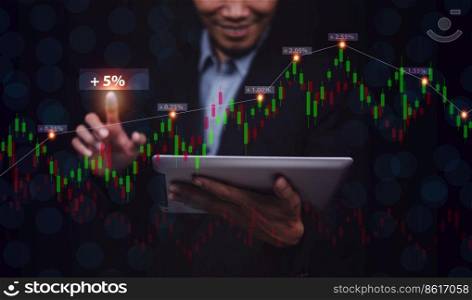 Businessman or trader are investment in stock market forex exchange and cryptocurrency bitcoins token