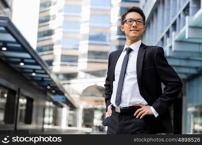 Businessman outdoors in city business district. I am professional and know it