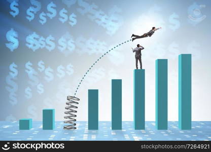 Businessman outperforming his competition jumping over