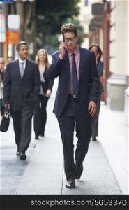 Businessman Outside Office On Mobile Phone