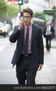 Businessman Outside Office On Mobile Phone