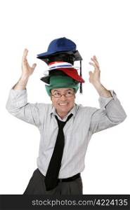 Businessman overwhelmed by too many responsibilities - symbolized by wearing too many hats. Isolated on white.