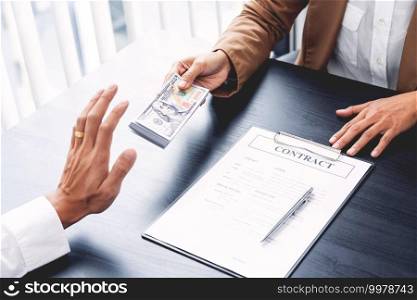 Businessman partner hand gesture rejecting refusing money, anticorruption concept