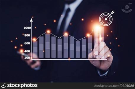 Businessman planning and strategy, Stock market, Business growth, progress or success concept. Businessman or trader is showing a growing virtual hologram stock, invest in trading.