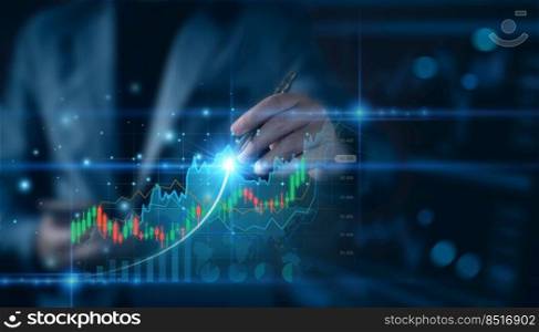 Businessman planning to invest in stock market. Businessman using pen touch virtual screen, stock graph is rising, economy is recovering, stock trading, bussiness start up, modern technology