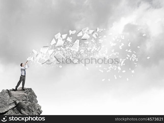 Businessman play pipe. Young businessman playing flute and papers flying out