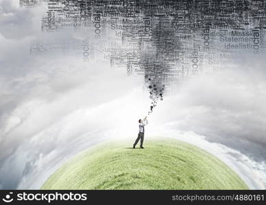 Businessman play pipe. Young businessman playing pipe and business concepts flying out