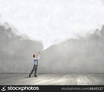 Businessman play pipe. Young businessman playing pipe and cloud coming out