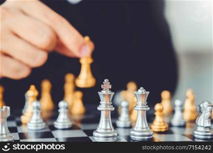 Businessman playing chess game Planning of leading strategy successful business leader concept