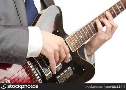 Businessman playing the guitar on white