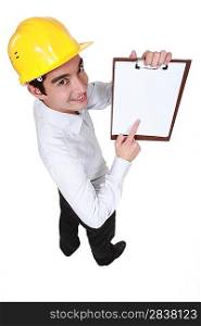 businessman pointing at a notepad