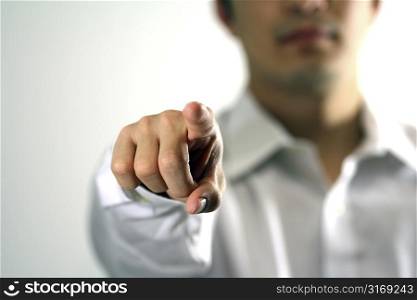 Businessman pointing at you