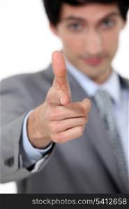 Businessman pointing at you