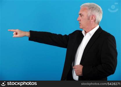 Businessman pointing his finger