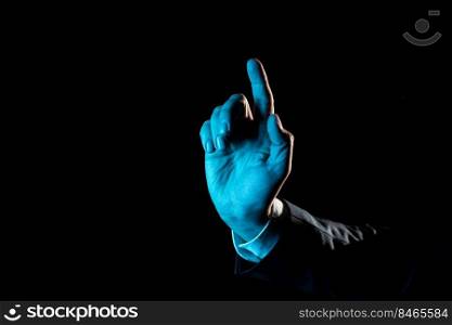Businessman Pointing Important Infortmations With One Finger.. One Finger Pointing Important Infortmations. Hand Presenting Crutial Announcement. Man Showing Recent Updates. Executive Displaying Critical Messages.