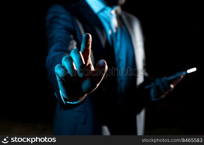 Businessman Pointing Important Infortmations With One Finger.. With One Finger Pointing Important Infortmations With Other Hand Holding Tablet. Businessman Showing Recent Updates. Executive Displaying Critical Messages.