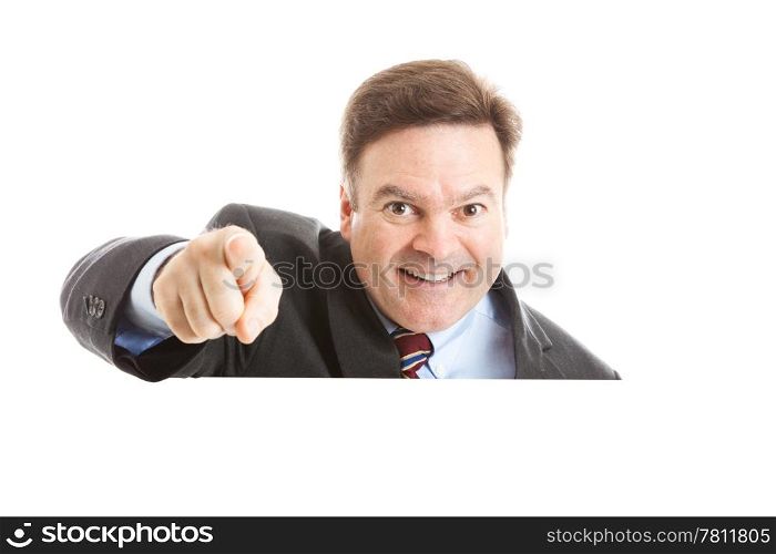 Businessman pointing over copyspace. Isolated on white.