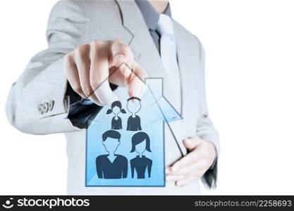 businessman pointing to hand drawn family icon and 3d house as insurance concept