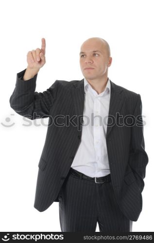 Businessman points finger up. Isolated on white background