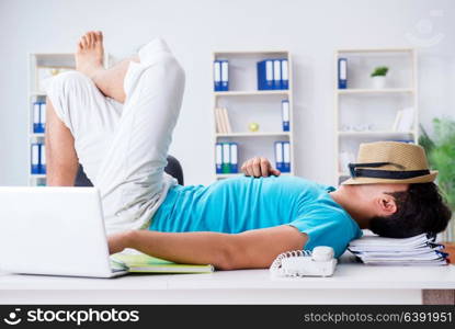 Businessman preparing for vacation in the office