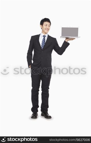 Businessman presenting laptop