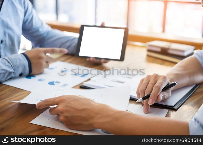 businessman presenting something at the seminar using tablet at the office , Audit concept at working.