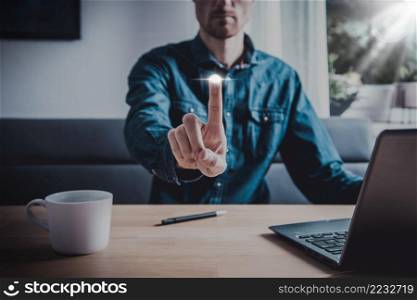 Businessman pressing button on virtual screen. Man pointing on futuristic interface. Innovation technology internet and business concept. Space for text and words. Abstract background