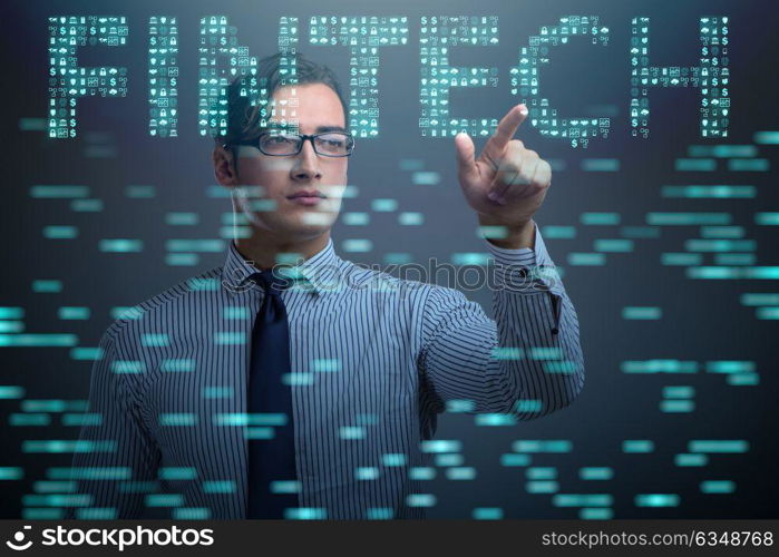 Businessman pressing buttons in fintech concept