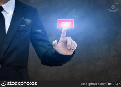 Businessman pressing OFF button icon. Concept of technology and business.