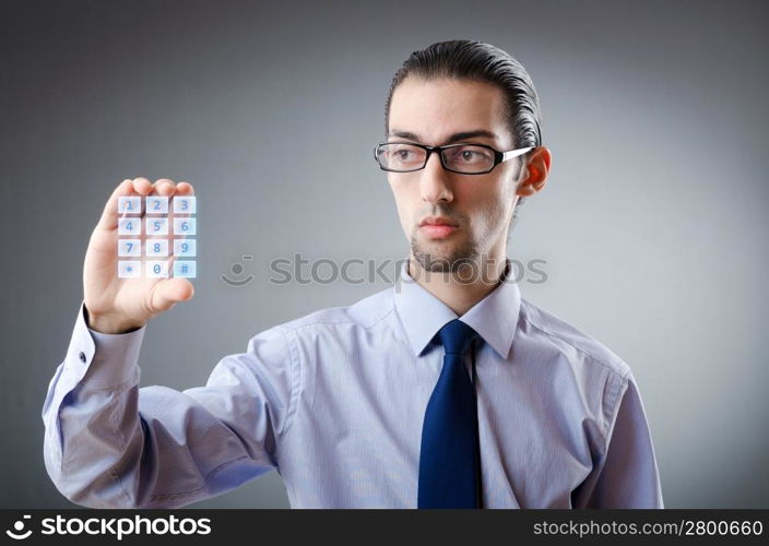 Businessman pressing virtual buttons