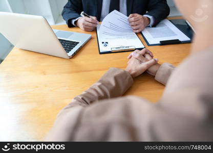 businessman professional women in suit explaining about her profile to business managers holding reading a resume, interview the job hiring career and placement concept.