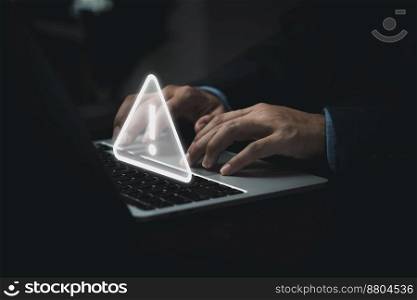 Businessman programmer, developer using laptop computer with triangle caution warning sign for notification error and maintenance concept.