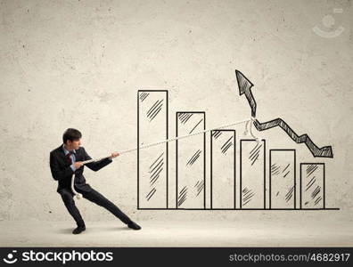 Businessman pulling graph. Image of young businessman pulling graph. Chart growth concept