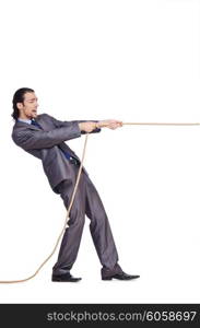 Businessman pulling rope on white