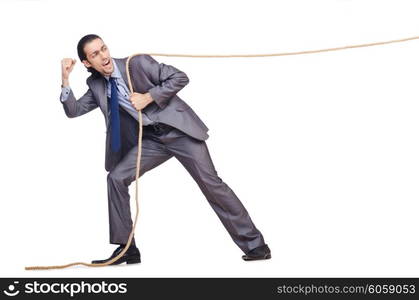 Businessman pulling rope on white