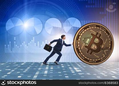 Businessman pushing bitcoin in cryptocurrency blockchain concept