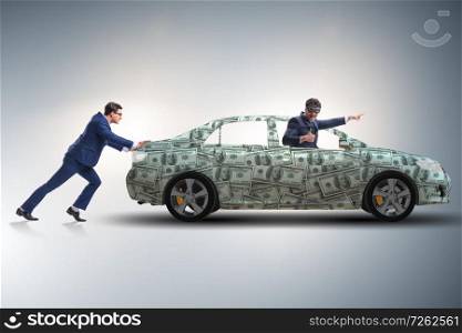Businessman pushing car in business concept. The businessman pushing car in business concept