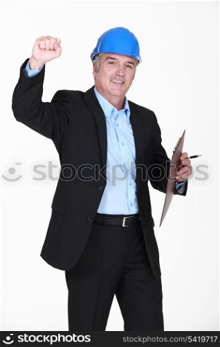 Businessman raising his fist