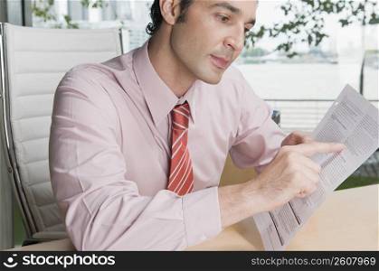 Businessman reading a document
