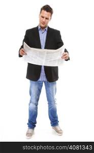 Businessman reading a newspaper full length isolated on white background