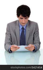 Businessman reading a report